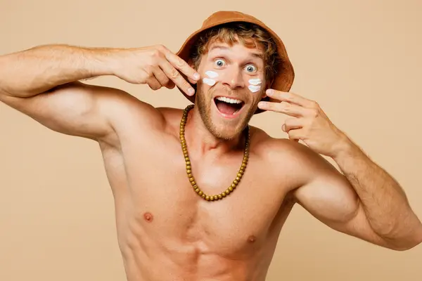 Insmeren gezicht ter bescherming tegen de zon
